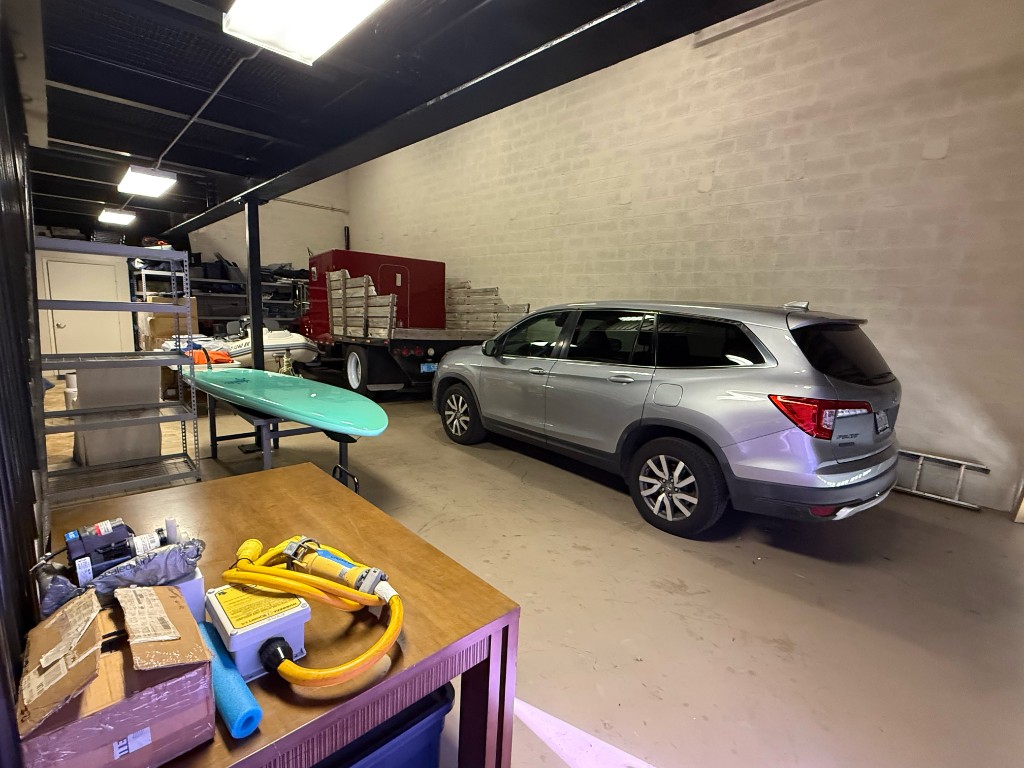 Interior storage bay with high ceilings and vehicle access
